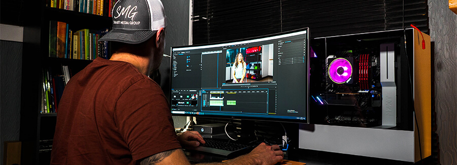 Man working in a video editing studio.
