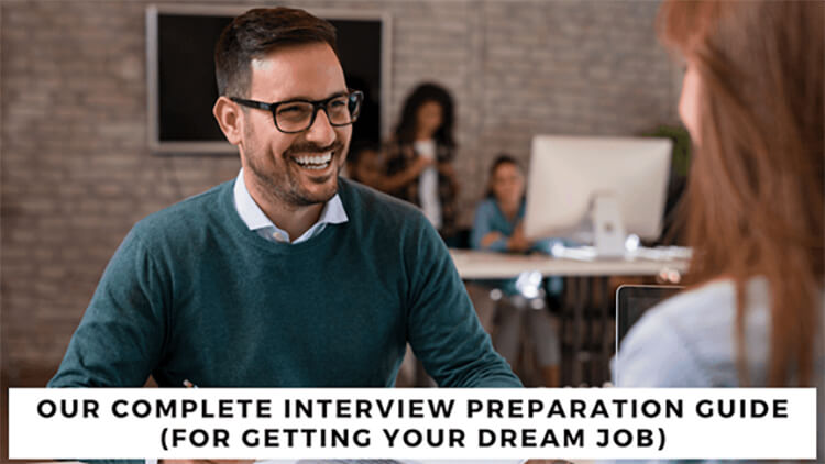 Male interviewer smiling with the caption. 'Our Complete Interview Preparation Guide (For Getting Your Dream Job)'