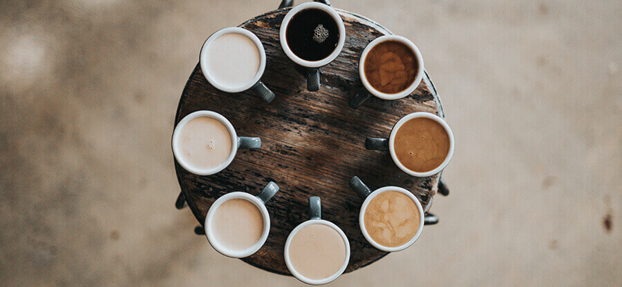 8 cups of coffee from black to white.